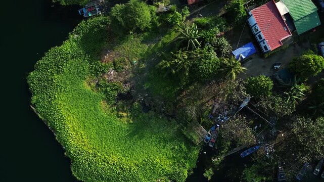 Zoom out aerial footage Agoncillo, line of boat parking at Agoncillo Laurel Rd Buso- Buso Batangas Philippines.