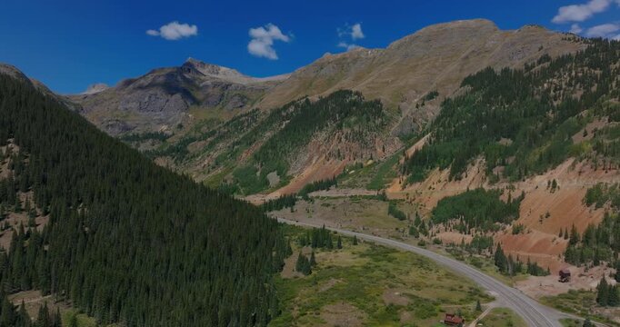 Elevated of alpine highway by steep San Juan Mountain slopes, Million Dollay Highway Colorado USA
