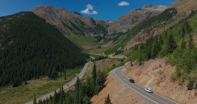 Iconic mountain highway sweeping by vast San Juan in southern Colorado, Million Dollay Highway Colorado USA