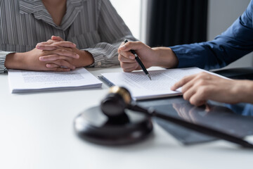 Lawyer businessman working with lawbook in office or courtroom Legal counsel with gavel and legal...