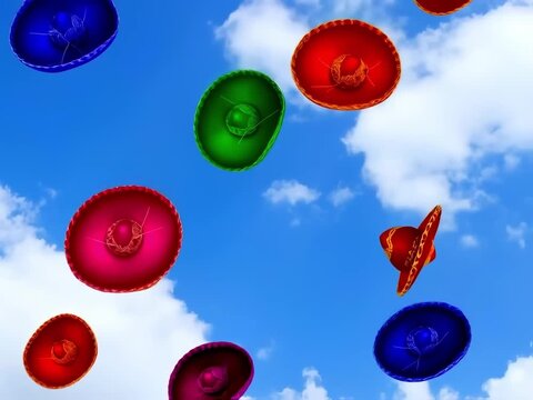 Colorful balloons floating in the blue sky with white clouds.