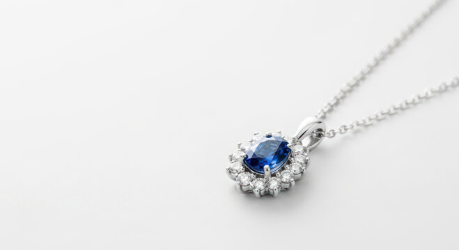 Silver Necklace with Blue Sapphire Pendant.