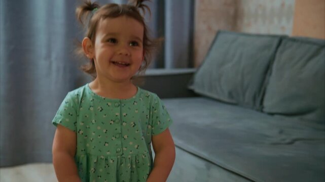 Adventurous Toddler Playing with Toy Stroller in a Cozy Living Room, Capturing Joyful Moments of Childhood Exploration and Imagination