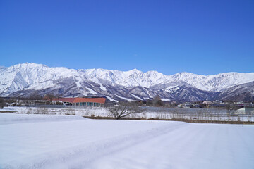 雪景色の白馬村と北アルプス © sunftaka77