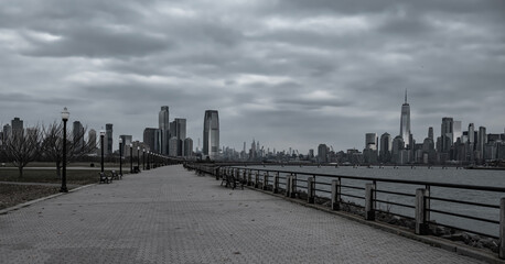 Fototapeta premium NYC with Manhattan in blue dusk tones. New York skyline cityscape. New York iconic view. New York downtown city. New York panorama Manhattan.