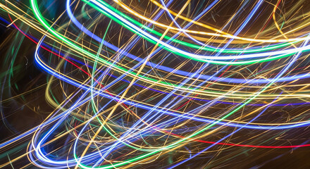 Construction Site with Multiple Cranes During Sunset.