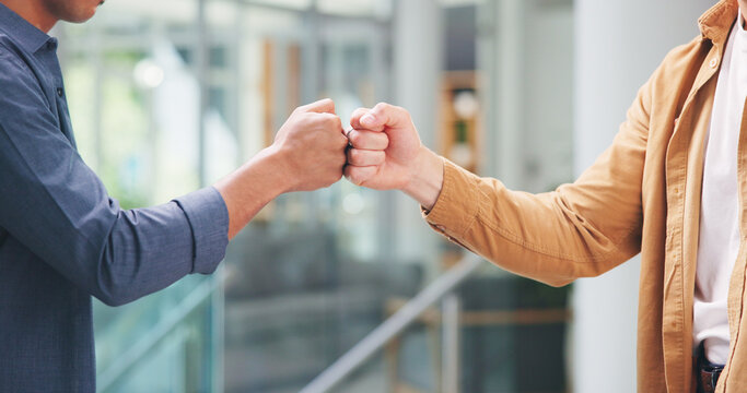 Business people, handshake and friends with fist bump for social connection and b2b networking. Coworking, collaboration and hands in meeting with synergy, solidarity or welcome to team for inclusion