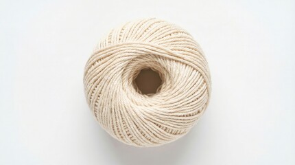 cream colored cotton yarn ball isolated on white background