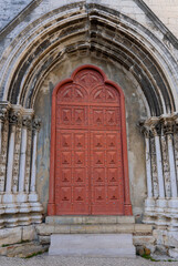 Obraz premium Red Gothic entrance door of the Carmo Convent (Convento do Carmo) in Lisbon Portugal PRT