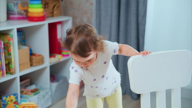 A Joyful Child Engaging in Playtime Activities with a Creative Approach, Showcasing a Fun and Whimsical Moment in a Colorful Playroom Setting