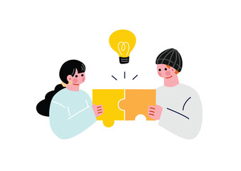 パズルのピースを合わせる男女