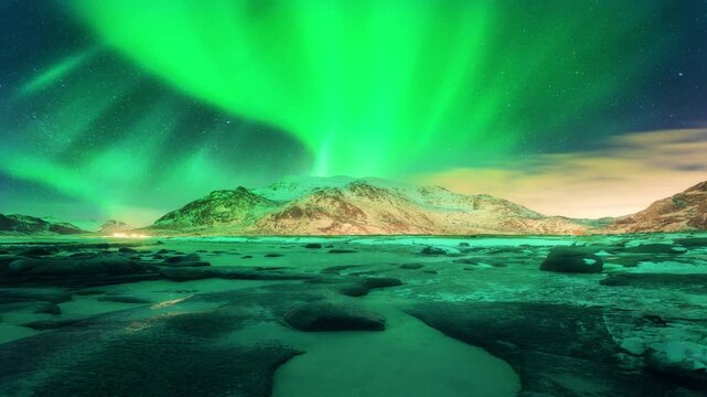 This animation of the northern lights was created in Adobe After Effects. Northern lights and the starry sky reflecting on the water.
Beautiful green and red aurora dancing over the hills.