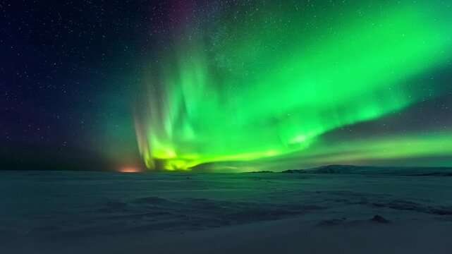 This animation of the northern lights was created in Adobe After Effects. Northern lights and the starry sky reflecting on the water.
Beautiful green and red aurora dancing over the hills.