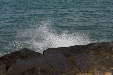 Powerful Tropical Ocean Waves Crashing on Volcanic Rocks &ndash; Dramatic Bali Seascape Energy