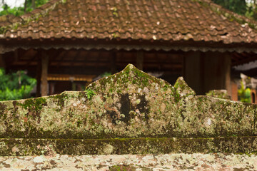 Mystical Moss-Covered Balinese Shrine in Lush Jungle Temple Grounds &ndash; Serene Tropical Spirituality