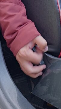 Twisting the seat counterclockwise to recline the backrest.