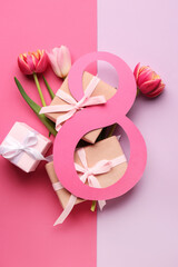 Paper figure 8 with gift boxes and tulips on color background. Happy Women's Day