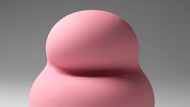 A smooth pink abstract 3D shape fluidly morphs and deforms on a grey background. Dynamic transformation.
