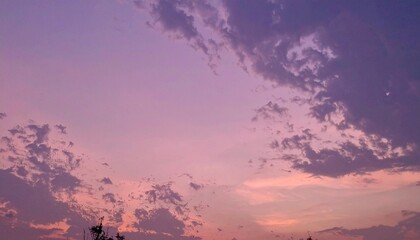 Purple sky with pinkish clouds and dark clouds