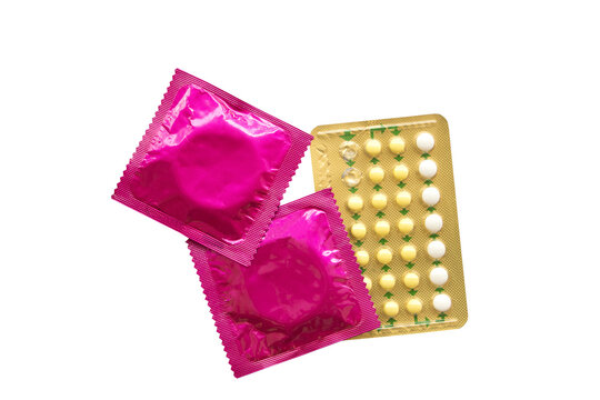 condom of a man for wear with birth control pills for woman eat protection couples arrangement flat lay style 
