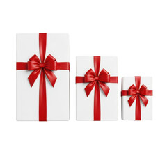 Three gift boxes wrapped in red paper with bows of varying sizes