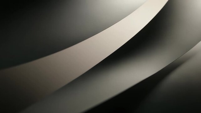 Curved white paper forming elegant lines and flowing waves, highlighting the interplay of light and shadow in a minimalist and smooth monochromatic composition