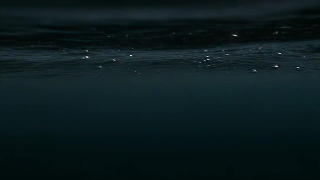 Ocean waves blurred into a soft, minimalist seascape with a serene horizon, muted grey blue tones and flowing motion evoking calm, meditative relaxation and subtle texture