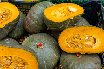 fresh pumpkin halves with seeds closeup
