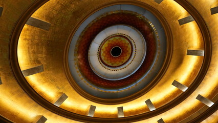 Obraz premium View of a circular ceiling featuring intricate patterns and golden accents, illuminated by soft lighting. The design includes a central circular motif with vibrant colors and decorative elements