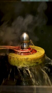 High-frequency induction surface hardening and red-hot parts completed in mass production.