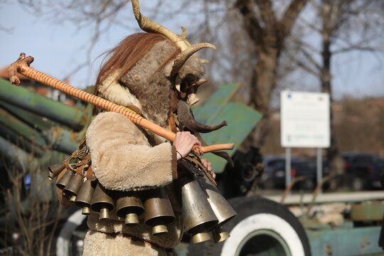 Zemen, Bulgaria - March 15, 2025: Masquerade festival Surva in Zemen, Bulgaria. People with mask called Kukeri dance and perform to scare the evil spirits.