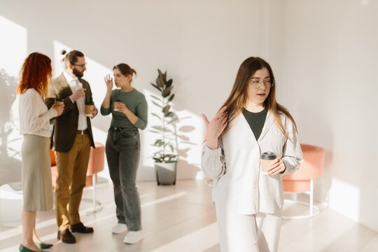 Employee feeling excluded during office coffee break