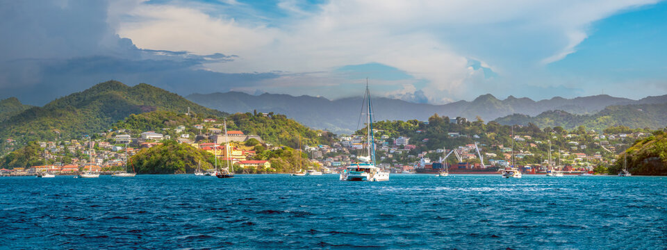 The harbor and waterfront of St. George's featuring the ruins of Fort George in the center, Grenada, Eastern Caribeean Sea