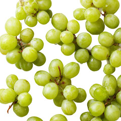 a collection of fresh green grapes on a white background.