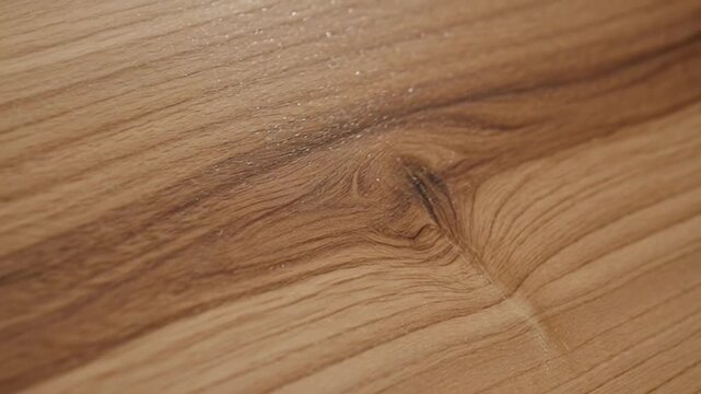 Warm wooden texture with natural grain and knot detail