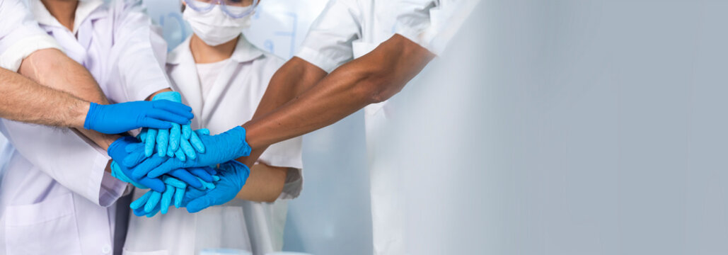 Banner Team asian scientist teamwork high five partner shake hands. Group Science Men research chemistry science. Banner Teamwork men biotech laboratory. Team Hand holing together with copy space