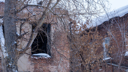 Ruined Brick House with Broken Window Winter Scene