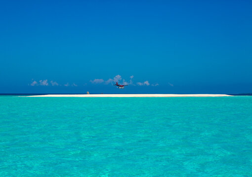 Seaplane Arriving At Soneva Fushi Hotel, Baa Atoll, Maldives