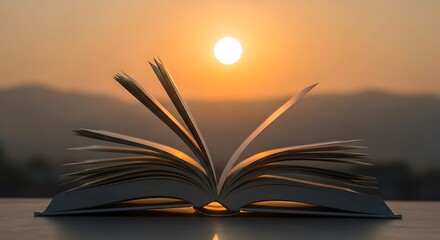 Open book with pages fluttering in the wind against a blurred sunset backdrop