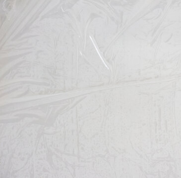 Plastic wrap texture overlay effect. Polyethylene packaging for vinyl or cd cover. Shrink crumpled plastic sleeve, vector mockup illustration.