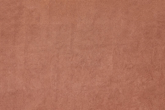 Wall Texture light pink or soft red color cement texture background light yellow cement texture Yellow Brown cement stucco plaster peach fuzz wall backdrop image Trendy 2024 color colour