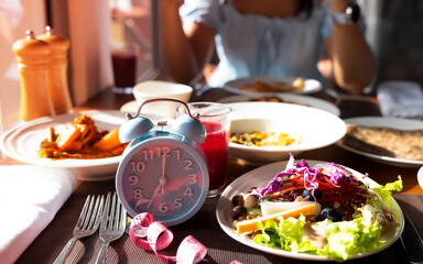 Blue Alarm Clock Waiting for the IF Meal