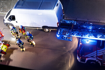 Top above view fire engine trucks brigade firefighters ladder and safety equipment at accident...