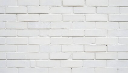Obraz premium Bright white painted brick wall provides a clean and modern backdrop