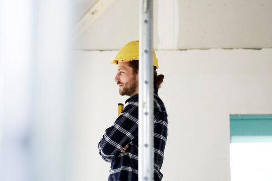 Pensive worker on a construction site