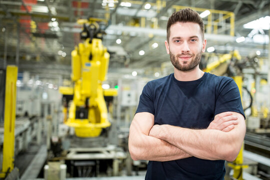 Portrait of confident worker in a modern factory