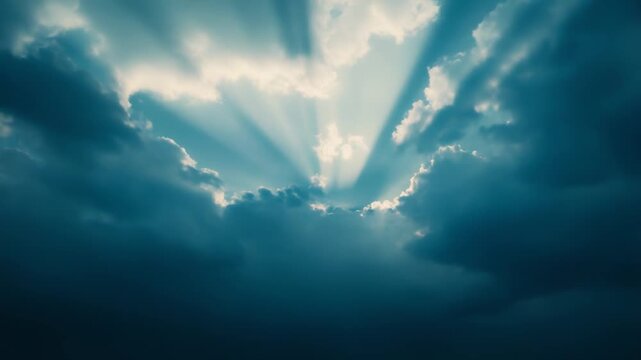 Sunlight beams piercing through dramatic, dark clouds, illuminating the sky with bright rays and symbolizing light, hope, spirituality, and divine intervention in nature