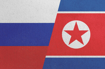 national flag of North Korea and Russia painted on the wall