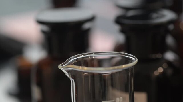 Perfume making process of dropping raw materials and blending into a flask