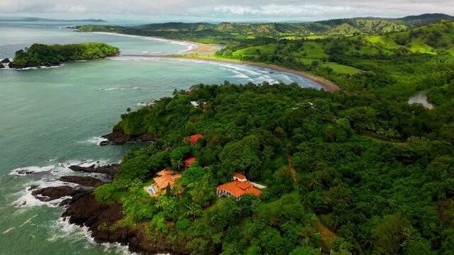 Drone aerial over Playa Torio estuary, Veraguas Panama, river meeting Pacific Ocean, lush tropical forest coastline, tranquil travel destination, cinematic nature landscape, filmed 2025.